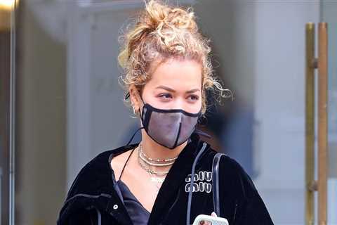 Rita Ora sports black velvet tracksuit during her trip to the spa in Sydney