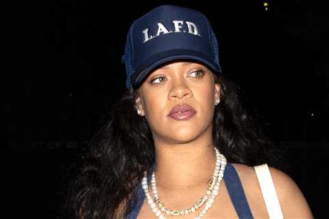 Rihanna shows off her bare stomach in a navy blue outfit during dinner in Malibu