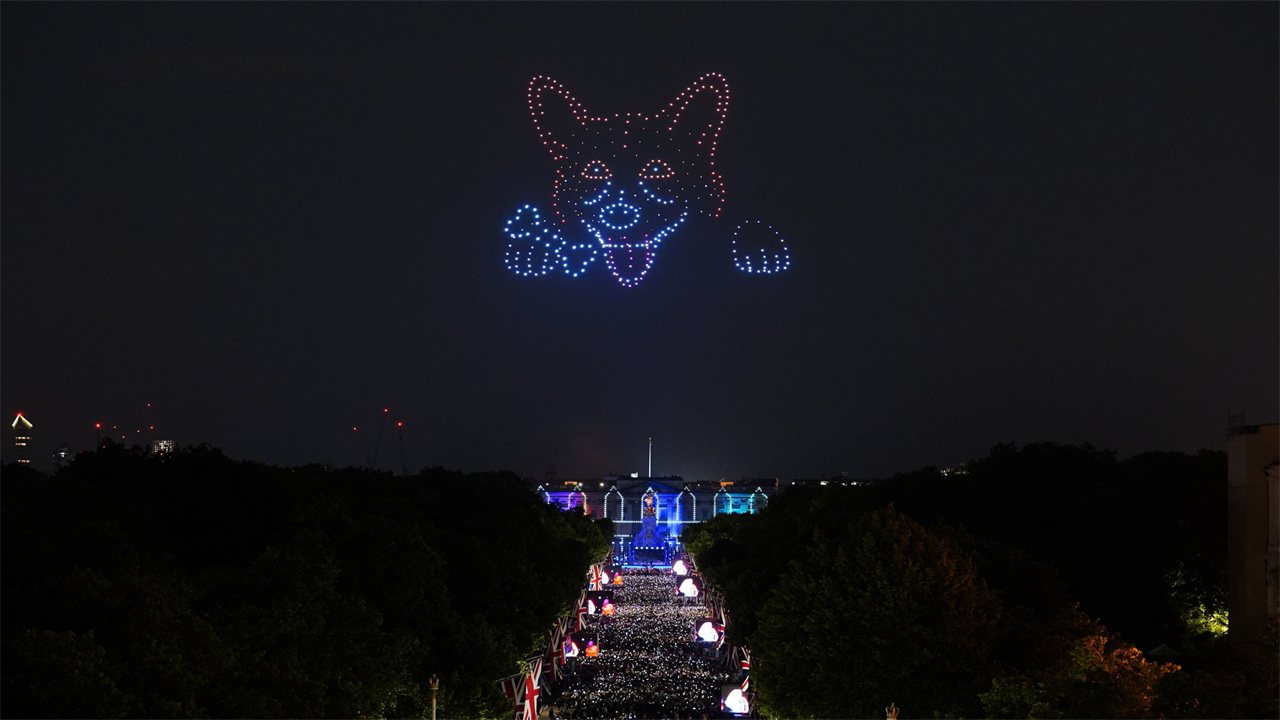 Royal fans amazed as drones of the Queen, her handbag & a corgi light up Buckingham Palace in jaw-dropping display