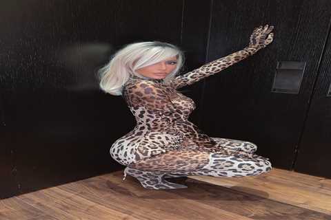Kim Kardashian shows off her shrinking butt in skintight, see-through leopard catsuit for racy new..