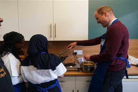 Prince William shrugs off brother Harry’s explosive bio as he focuses on Royal duties & cooks with..