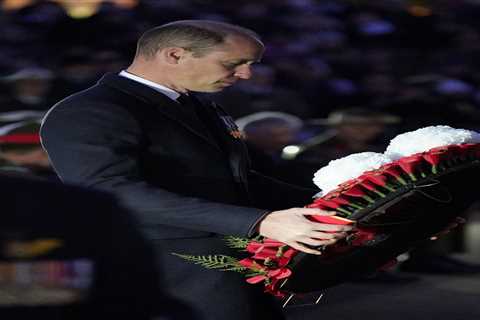 Prince William pays his respects to fallen Australian and New Zealand troops at Anzac Day dawn..