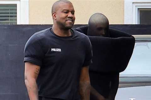 Kanye West Wore His Black Signature Vetements ‘Polizei’ Shirt and Leggings with wife Bianca Censori ..