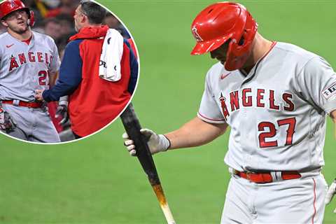 Angels’ Mike Trout exits with apparent injury after swinging