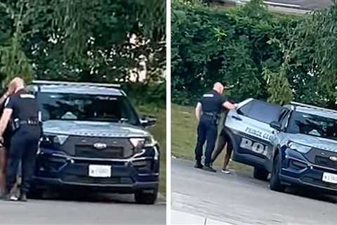 Maryland Cop Caught Allegedly Kissing Young Woman, Goes Into Car with Her