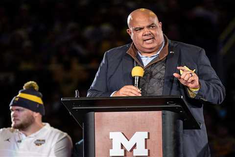 Michigan AD Warde Manuel promises he’s ‘working on’ Jim Harbaugh contract