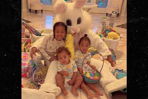 Nick Cannon Hops Around Town To Celebrate Easter With All 12 Kids