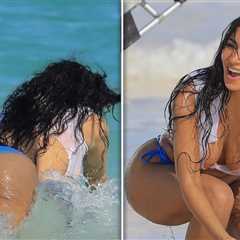 Kim Kardashian Dives Into Ocean in Tiny White Top, Bikini Bottoms