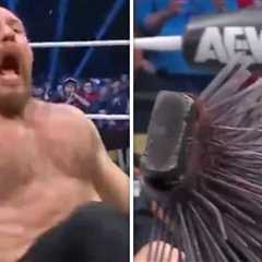 AEW's Jon Moxley Gets Spiked Board Stuck In Back During Gruesome Match