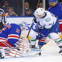 Rangers grind out win over Canucks to end three-game skid, keep playoff hopes alive