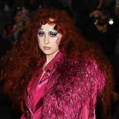 Chappell Roan Makes Her Met Gala Debut in Glam-Rock Magenta Suit