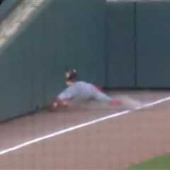 Reds rookie Tyler Callihan breaks arm crashing into wall as play turns into sad home run