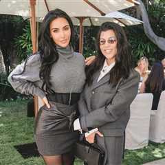 Kim Kardashian Celebrates Law School Graduation in Gray Sweater and a Black Vintage Versace..