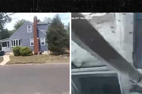 Dump Truck Crashes Through Suburban House, on Video, Injuring Resident