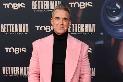 Robbie Williams Announces New Album ‘Britpop,’ Shares Fiery Single With Black Sabbath’s Tony Iommi