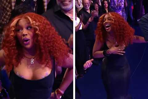 SZA Struggles to Make It Up to AMA Stage in Skin-Tight Dress