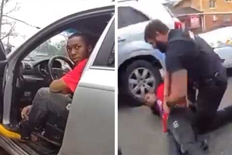 Video Shows Cops Punching Black Man During Traffic Stop, Busted Lip In Mug Shot