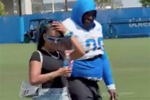 Fans let Chargers player have it after he brings girlfriend to camp