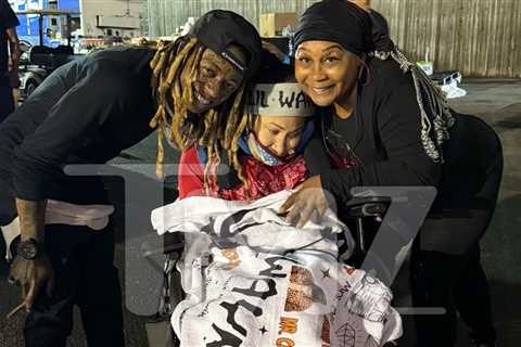 Lil Wayne Gives Cross, Chain to Disabled Fan Forced to Wait 17 Years to See Him