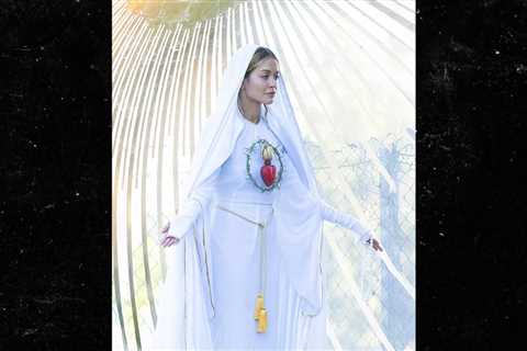 Rita Ora Poses in Virgin Mary Get-Up Outside Capitol Records