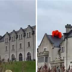 Paraglider Crash-Lands on Hotel Roof, Dangles Dangerously, on Video