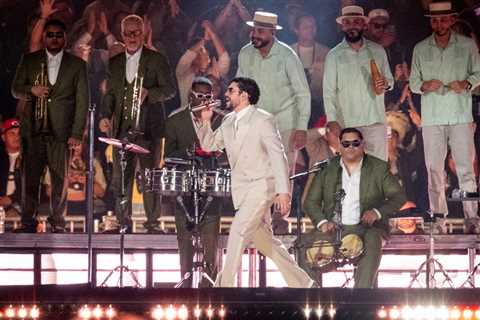 Bad Bunny Slips & Falls During Concert, But His Fans Keep the Show Going for Him