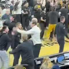 Nebraska’s Fred Hoiberg angrily smacks phone out of Iowa fan’s hand in tense court-storming scene