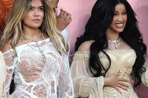 Cardi B in Cream Zimmermann and Karol G in White Ann Demeulemeester Dance with Bad Bunny at the..