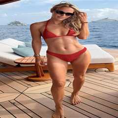 Caroline Wozniacki sizzles in red bikini on a yacht in new vacation photos