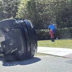 Tiger Woods spotted using cell phone on side of road after alleged Florida DUI crash