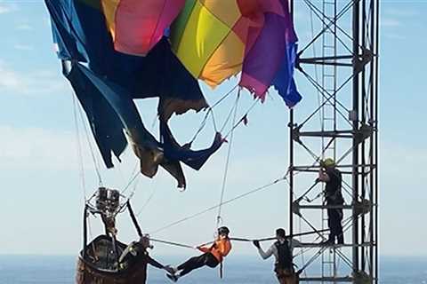 Hot Air Balloonists Rescued After Getting Tangled on 900-Foot-Tall Tower, on Video
