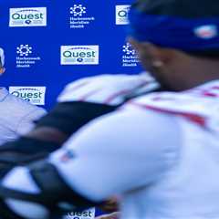 Kayvon Thibodeaux has some fun with John Harbaugh during Giants press conference