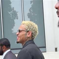Chris Brown All Smiles Arriving at Court to Fight Ex-Housekeeper's $90 Mil Lawsuit