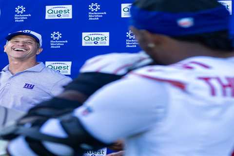 Kayvon Thibodeaux has some fun with John Harbaugh during Giants press conference