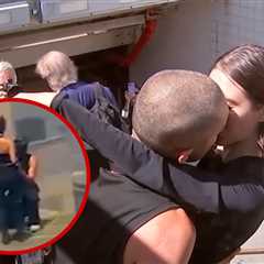 Empire State Building Climbers Kiss After Jail Release