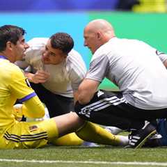 Belgian goalkeeper felled by injury as backup blinks in tough loss to Spain