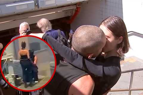 Empire State Building Climbers Kiss After Jail Release
