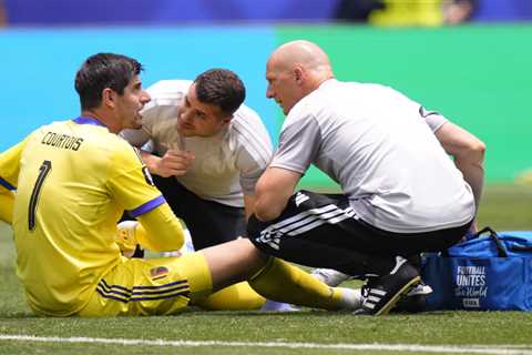 Belgian goalkeeper felled by injury as backup blinks in tough loss to Spain