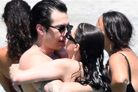'Heated Rivalry' Star Hudson Williams Packs on PDA With GF on Beach in Greece