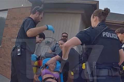 Eminem's Ex-Wife Kim Scott Screams at Cops in Body Cam Video From Attempted Suicide