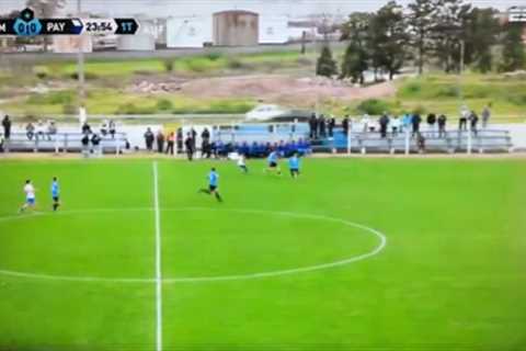 Soccer ball kicked on road causes car crash during Uruguayan match in scary moment