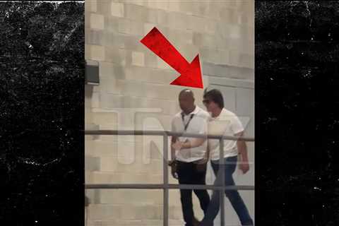 Tom Cruise Filmed Slipping Inside Daytona Speedway to Announce 'Days of Thunder' Sequel