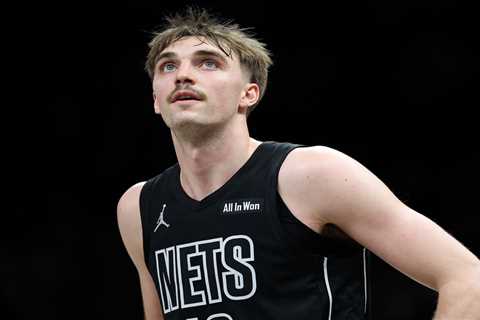 Nets bring back 7-footer Grant Nelson on two-way deal